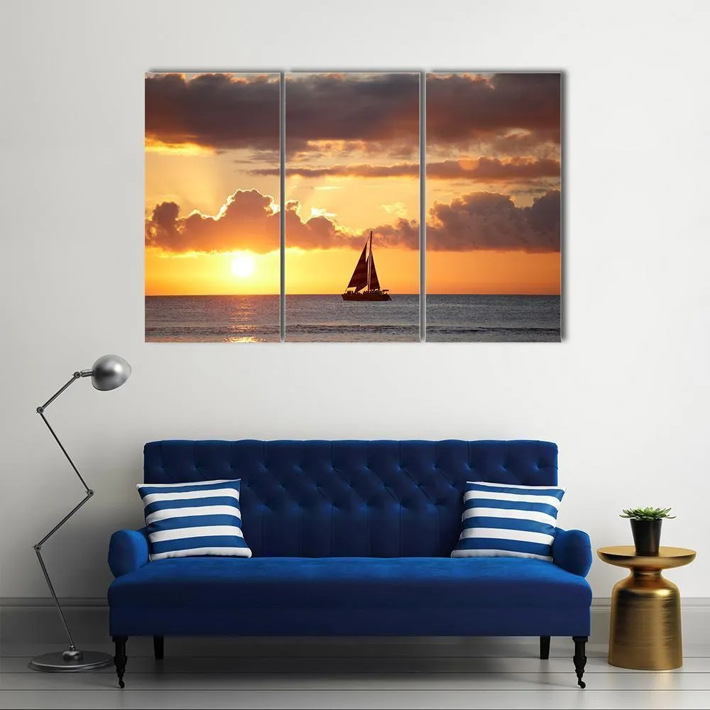 Boat In Ocean At Sunset Canvas Wall Art