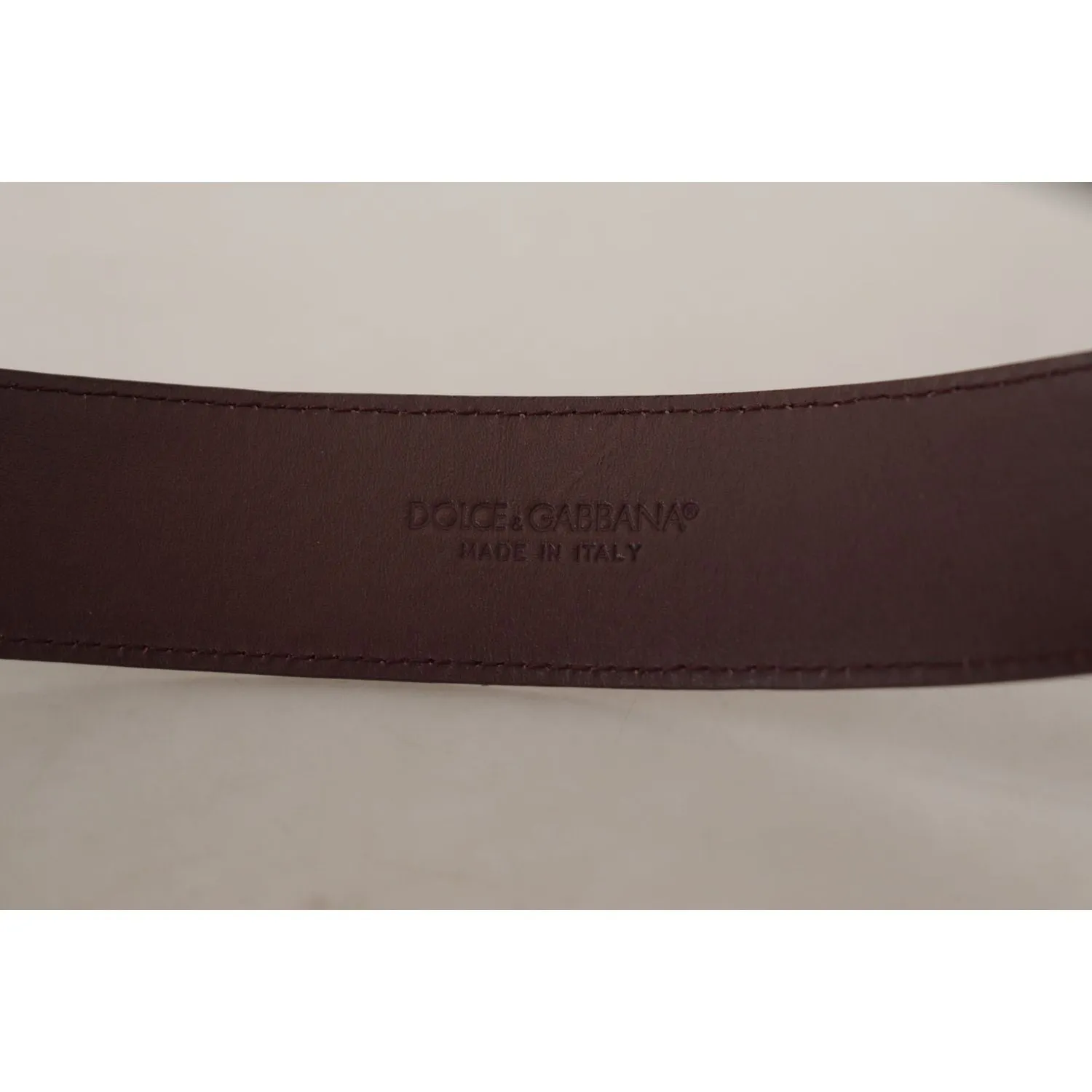 Dolce & Gabbana Elegant Maroon Leather Belt with Engraved Buckle